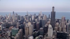 4.8K aerial stock footage Downtown Chicago skyscrapers and Willis Tower on a hazy day, Illinois Aerial Stock Footage | AX0001_070
