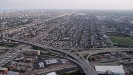 4.8K aerial stock footage approaching Interstate 90, 94, and 55 interchange, urban neighborhood, South Chicago, Illinois Aerial Stock Footage | AX0001_075
