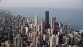 4.8K aerial stock footage video approaching John Hancock Center, Lake Michigan, Downtown Chicago, Illinois Aerial Stock Footage | AX0001_085