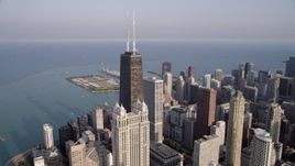 4.8K aerial stock footage orbiting John Hancock Center, Downtown Chicago, Illinois Aerial Stock Footage | AX0001_087