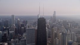 J4.8K aerial stock footage of John Hancock Center on a hazy day, Downtown Chicago, Illinois Aerial Stock Footage | AX0001_090