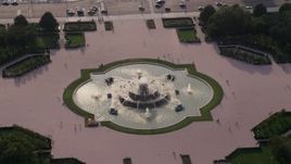 4.8K aerial stock footage tilting down on Buckingham Fountain in Grant Park, Chicago, Illinois Aerial Stock Footage | AX0001_097