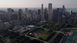 4.8K aerial stock footage fly over Grant Park toward downtown skyscrapers, Downtown Chicago, Illinois Aerial Stock Footage | AX0001_102