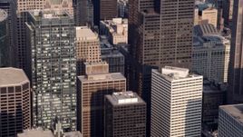 4.8K aerial stock footage tilting down side of Willis Tower, Downtown Chicago, Illinois Aerial Stock Footage | AX0001_110