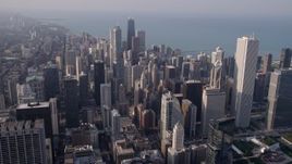 4.8K aerial stock footage fly over downtown to approach skyscrapers and the lake in Downtown Chicago, Illinois Aerial Stock Footage | AX0001_115