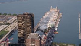 4.8K aerial stock footage flying by Lake Point Tower and Navy Pier, Downtown Chicago, Illinois Aerial Stock Footage | AX0001_119