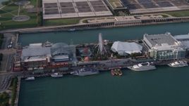 4.8K aerial stock footage of Ferris Wheel on Navy Pier in Chicago, Illinois Aerial Stock Footage | AX0001_122