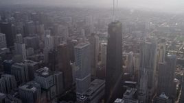 4.8K aerial stock footage of John Hancock Center in Downtown Chicago, on a hazy day, Illinois Aerial Stock Footage | AX0001_131