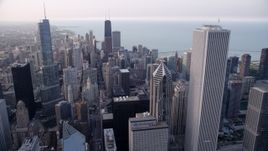 4.8K aerial stock footage panning across Downtown Chicago revealing part of Grant Park and boats in the harbor, Illinois Aerial Stock Footage | AX0001_149