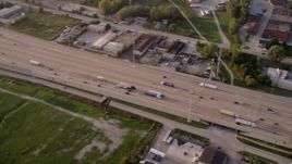 4.8K aerial stock footage panning across Kingery Expressway on a hazy day, in Lansing, Chicago, Illinois Aerial Stock Footage | AX0001_175