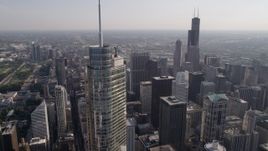 4.8K aerial stock footage tilt from Tribune Tower to reveal and approach Trump Tower Chicago and Willis Tower, Downtown Chicago, Illinois Aerial Stock Footage | AX0002_027