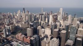 4.8K aerial stock footage of Downtown Chicago skyscrapers seen from Willis Tower, reveal the Chicago River, Illinois Aerial Stock Footage | AX0002_034