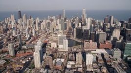 4.8K aerial stock footage of Chicago River and surrounding skyscrapers and high-rises, Downtown Chicago, Illinois Aerial Stock Footage | AX0002_037