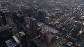 4.8K aerial stock footage of following the river through downtown to train station and pan to follow river, Downtown Chicago, Illinois Aerial Stock Footage | AX0002_056