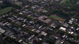 4.8K aerial stock footage bird's eye of neighborhood and school, tilt to reveal row houses in West Side Chicago, Illinois Aerial Stock Footage | AX0002_059