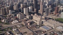 4.8K aerial stock footage tilt from freeway near Circle Interchange and reveal Willis Tower and Downtown Chicago, Illinois Aerial Stock Footage | AX0002_063