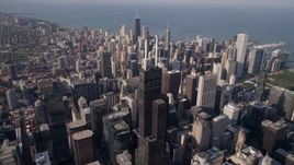 4.8K aerial stock footage approach top of Willis Tower and tilt to the spires, Downtown Chicago, Illinois Aerial Stock Footage | AX0002_067