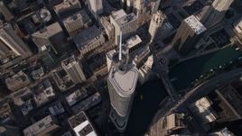 4.8K aerial stock footage tilt to bird's eye view of Trump International Hotel and Tower and the Chicago River in Downtown Chicago, Illinois Aerial Stock Footage | AX0002_071