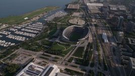 4.8K aerial stock footage approach Soldier Field and boats in Burnham Harbor, Chicago, Illinois Aerial Stock Footage | AX0002_083