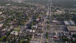 4.8K aerial stock footage fly over Mosque Maryam and follow S Stony Island Avenue past urban neighborhoods, South Chicago, Illinois Aerial Stock Footage | AX0002_100