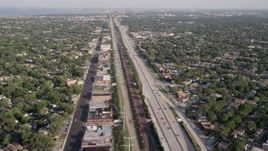 4.8K aerial stock footage approach Interstate 90, passing urban neighborhoods, South Chicago, Illinois Aerial Stock Footage | AX0002_101