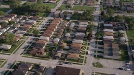 4.8K aerial stock footage of flying over a residential neighborhood, Lansing, Illinois Aerial Stock Footage | AX0002_106