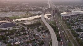 4.8K aerial stock footage tilt to reveal the Chicago Skyway and High Bridge spanning the Calumet River at twilight, Illinois Aerial Stock Footage | AX0003_012