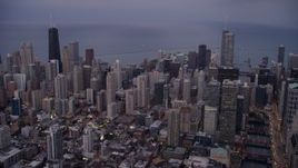 4.8K aerial stock footage of Downtown Chicago high-rises and skyscrapers at sunset, Illinois Aerial Stock Footage | AX0003_088