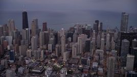 4.8K aerial stock footage of Downtown Chicago cityscape and Lake Michigan at twilight, Illinois Aerial Stock Footage | AX0003_089