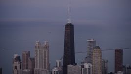 4.8K aerial stock footage of John Hancock Center and high-rises at twilight, Downtown Chicago, Illinois Aerial Stock Footage | AX0003_090