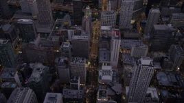 4.8K aerial stock footage bird's eye view of N Michigan Avenue through Downtown Chicago at twilight, Illinois Aerial Stock Footage | AX0003_098