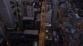4.8K aerial stock footage bird's eye view of N Michigan Avenue past Two Prudential Plaza to Grant Park, Downtown Chicago, Illinois, twilight Aerial Stock Footage | AX0003_100
