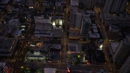 4.8K aerial stock footage of a bird's eye view of following Clark Street through Downtown Chicago at twilight, Illinois Aerial Stock Footage | AX0003_110