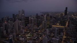 4.8K aerial stock footage of Downtown Chicago skyscrapers at twilight, Illinois Aerial Stock Footage | AX0003_112