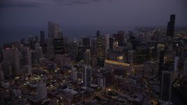 4.8K aerial stock footage of Downtown Chicago skyscrapers and high-rises at twilight, Illinois Aerial Stock Footage | AX0003_113