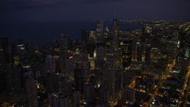 4.8K aerial stock footage of flying over Downtown Chicago at night, Illinois Aerial Stock Footage | AX0003_142