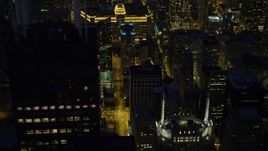 4.8K aerial stock footage of flying by Willis Tower at night and tilt to N Franklin Street, Downtown Chicago, Illinois Aerial Stock Footage | AX0003_155