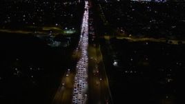 5K aerial stock footage fly over heavy nighttime traffic on Interstate 170 through Sun Valley, California Aerial Stock Footage | AX0004_001E