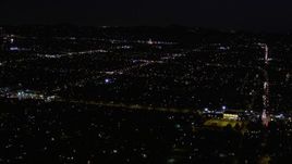 5K aerial stock footage of suburban residential neighborhoods at night in Van Nuys, California Aerial Stock Footage | AX0004_005