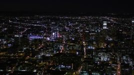 5K aerial stock footage orbit skyscrapers near Staples Center at night in Downtown Los Angeles, California Aerial Stock Footage | AX0004_025E