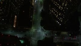 5K aerial stock footage bird's eye view of South Hope Street in Downtown Los Angeles at night, California Aerial Stock Footage | AX0004_052E