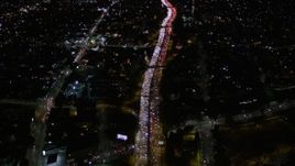 5K aerial stock footage fly over heavy nighttime traffic on Highway 101 through Echo Park, California Aerial Stock Footage | AX0004_068