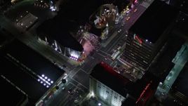 5K aerial stock footage reverse view of Grauman's Chinese Theater on Hollywood Boulevard at night, California Aerial Stock Footage | AX0004_079