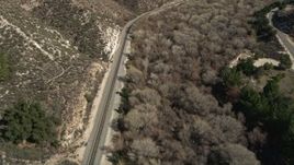 5K aerial stock footage of a railroad track through Santa Clarita Countryside in California Aerial Stock Footage | AX0005_022