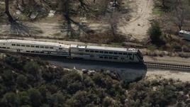 5K aerial stock footage track passenger train in Santa Clarita, California Aerial Stock Footage | AX0005_025E