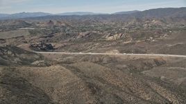 5K aerial stock footage approach Vasquez Rocks Park in the Mojave Desert, California Aerial Stock Footage | AX0005_035