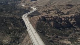 5K aerial stock footage of light traffic on Highway 14 through the Mojave Desert, California Aerial Stock Footage | AX0005_037