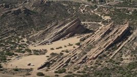5K aerial stock footage of rock formations in the desert at Vasquez Rocks Park, California Aerial Stock Footage | AX0005_038E