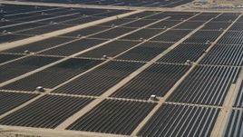 5K aerial stock footage orbit massive solar energy array in the desert of Antelope Valley, California Aerial Stock Footage | AX0005_078