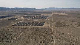 5K aerial stock footage flyby Mojave Desert solar energy array in California Aerial Stock Footage | AX0005_117